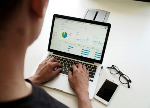 Business professional researching federal procurement and logistics strategy.